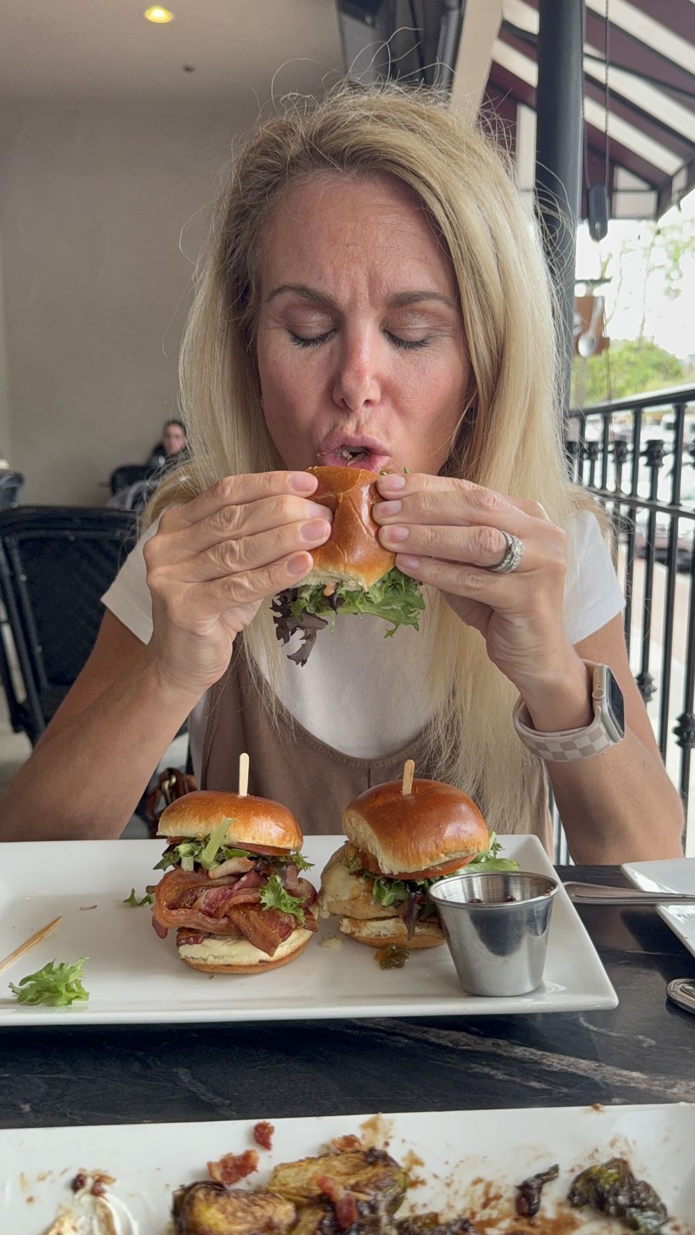 Dana eating a slider