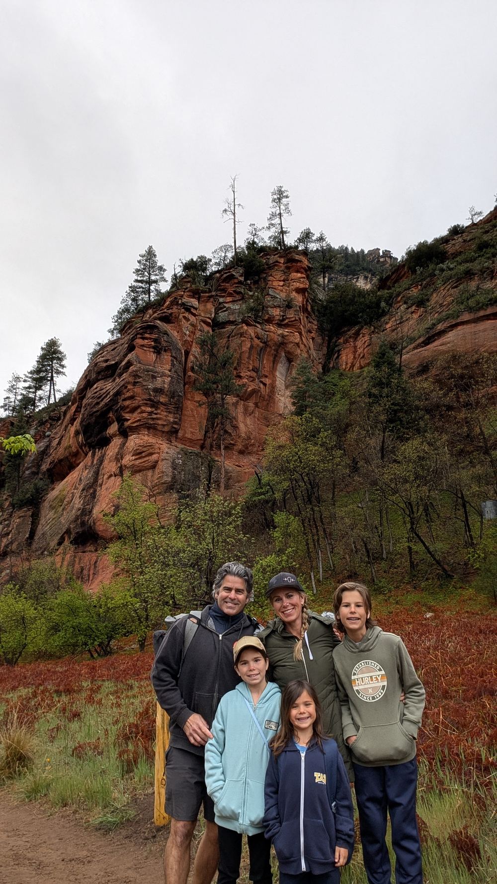 Family at Sedona red rock trailhead