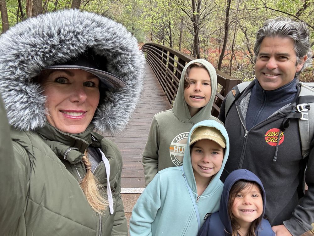 Family selfie on bridge