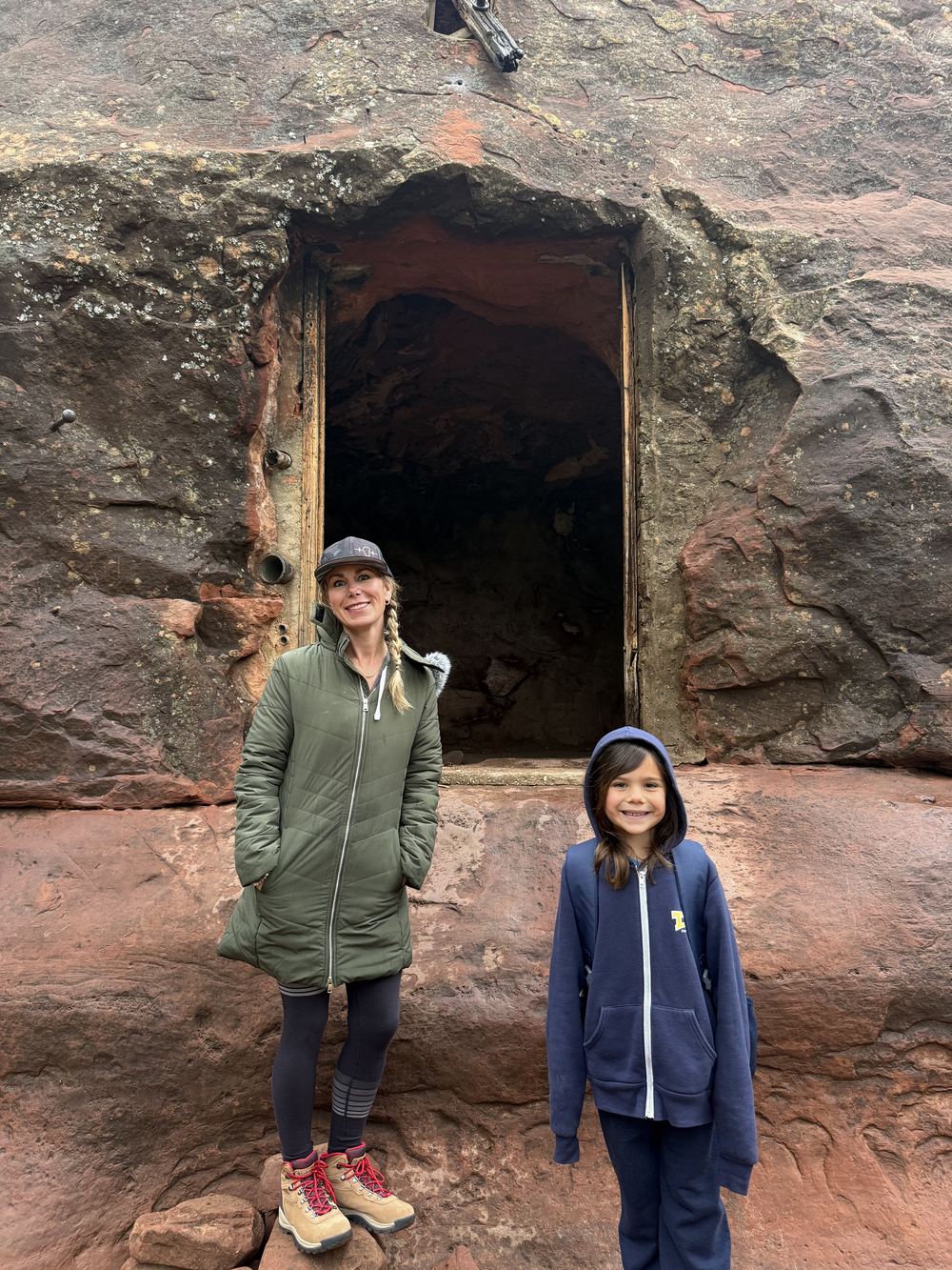 Dana and kid at the cave