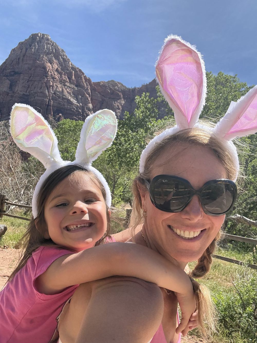 Dana and Capri bunny ear piggyback selfie